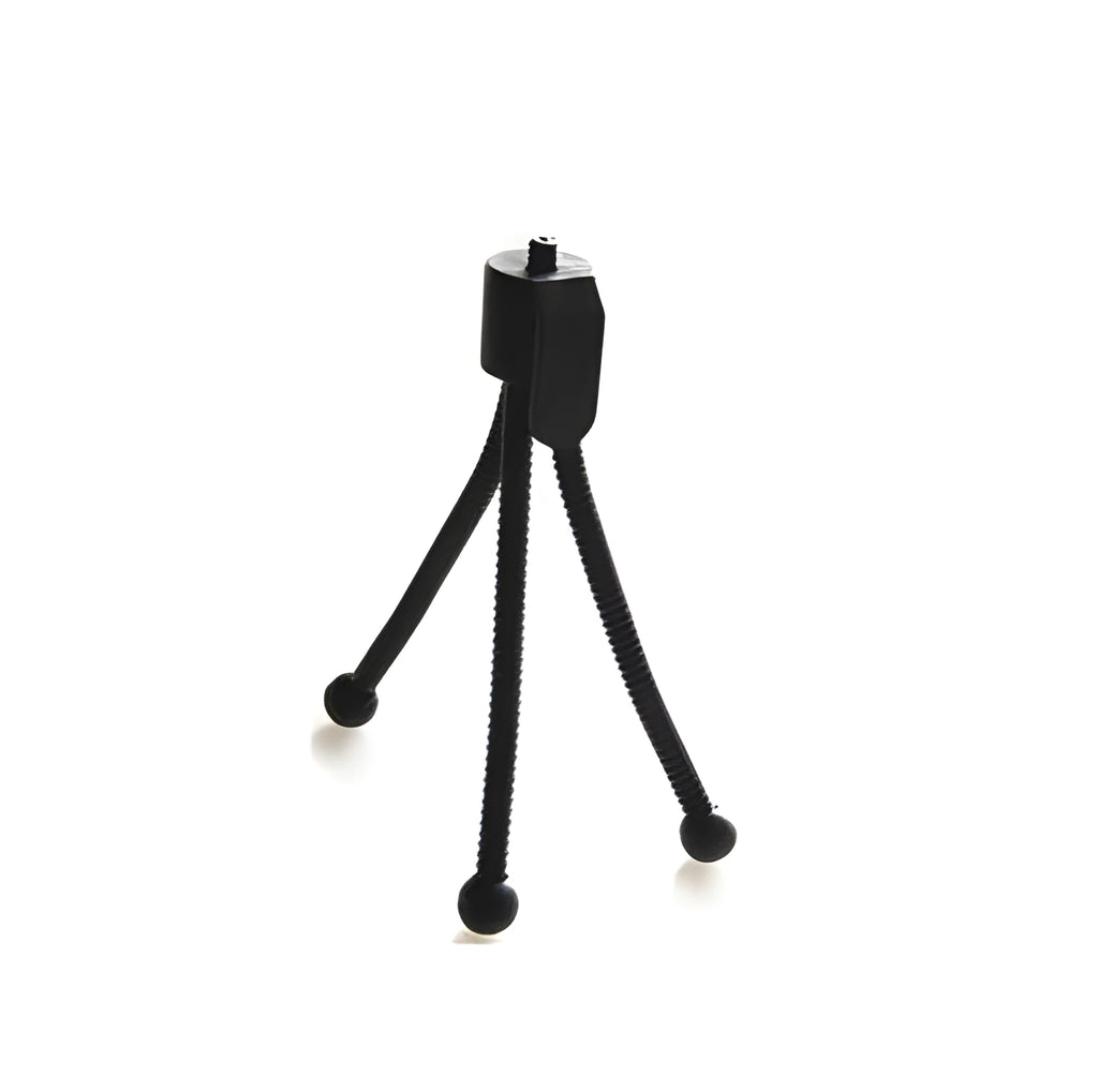 Small aluminium folding tripod with ball head mounted with smartphone on desktop