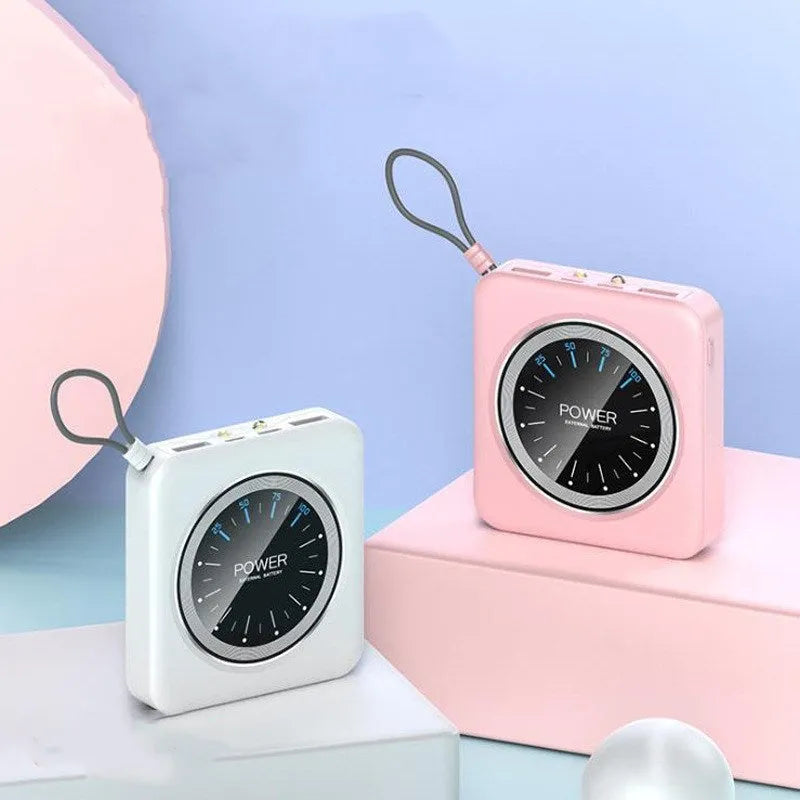 Compact mini clock charger power bank in mint green showing multi-USB ports and alloy case.