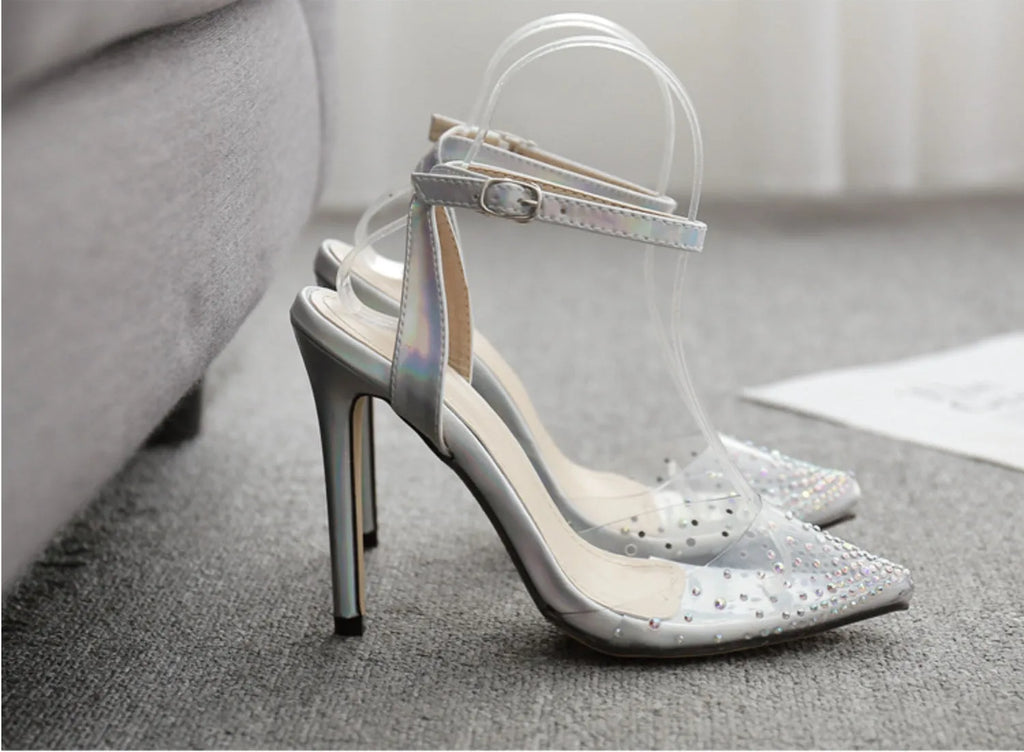 Women's pointed toe diamond sandals with a stiletto heel and PVC upper, shown in available sizes.