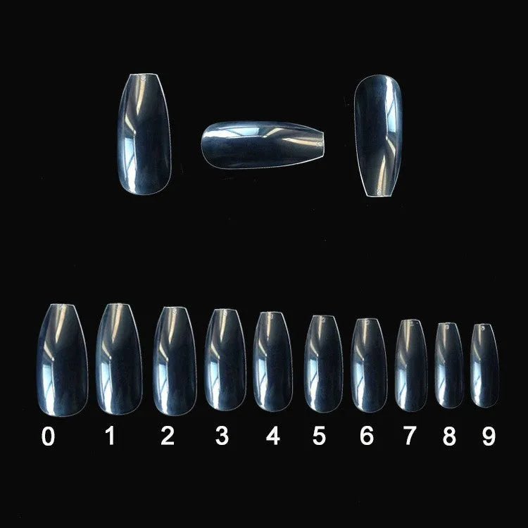 500 clear transparent false nails in 10 sizes arranged on a table, made from ABS plastic