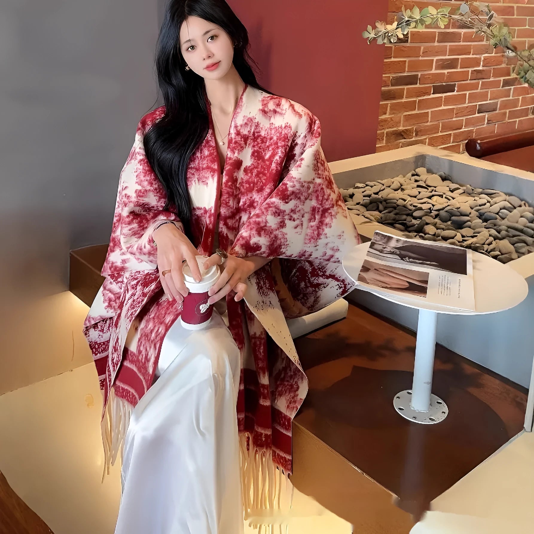 Women's polyester tassel-trimmed scarf cape draped over shoulders