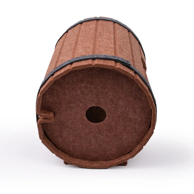 Assembled wine barrel shaped cat bed made from three grey polyester felt panels with binding straps.
