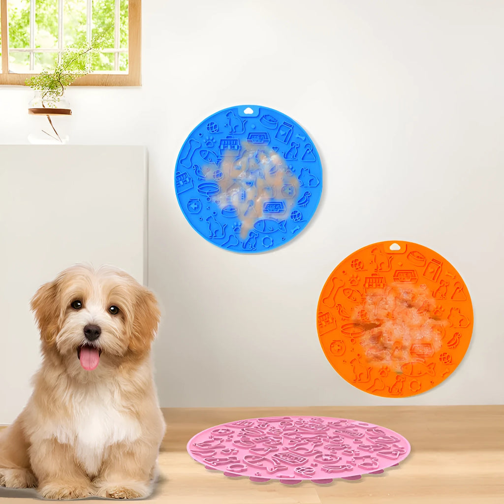 Round silicone pet lick mat with suction base in blue colour on tiled surface