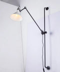 Nordic style rotating rocker arm wall lamp with black iron lampshade and warm bulb