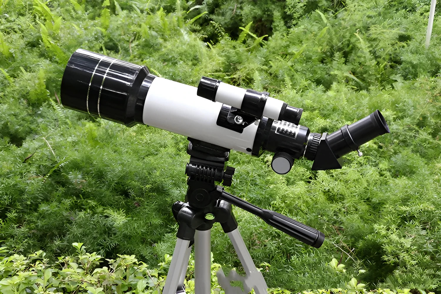 Dark blue children's astronomical telescope on tripod with 16X-66X magnification