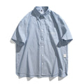 Blue striped short-sleeved overall shirt with loose fit cardigan style