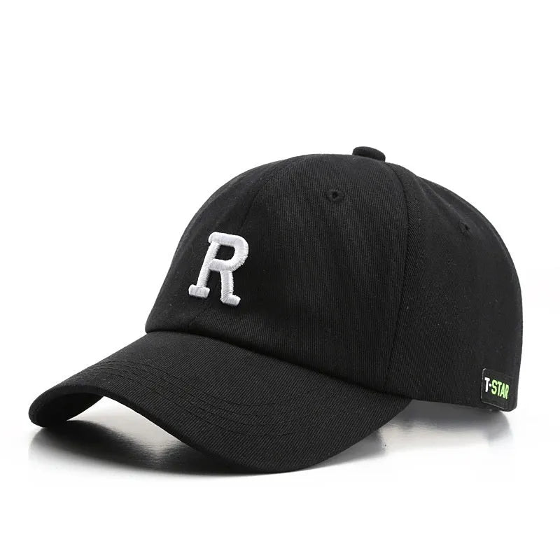 Adjustable unisex baseball cap with embroidered letter R in black cotton satin weave with brim