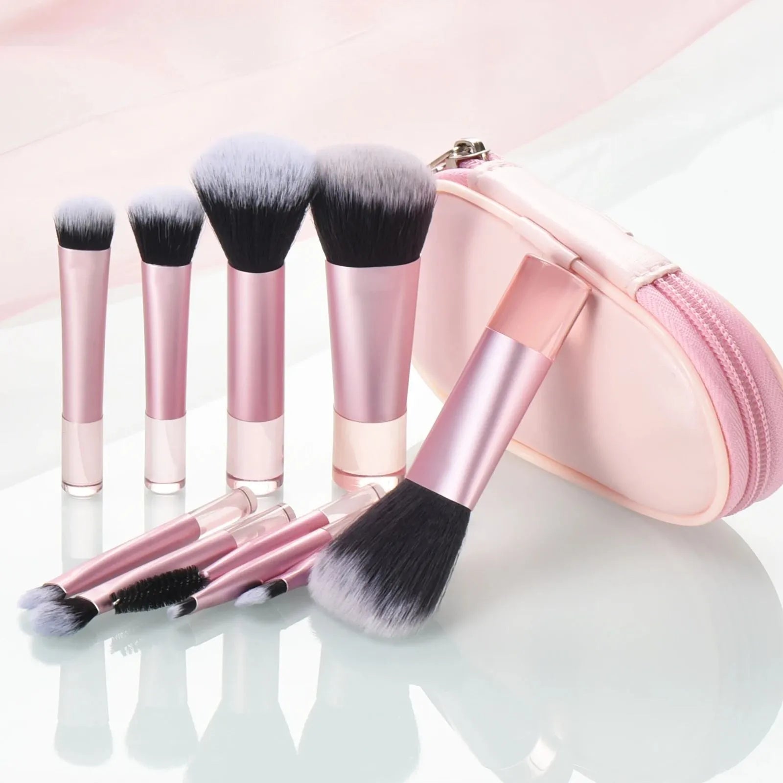 Mini makeup brush set with storage bag, artificial fibre and goat hair bristles, long handle, and air cushion puff