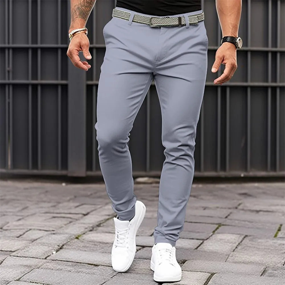 Men's pure colour slim-fit trousers in black, micro-elastic cotton blend, side pockets, mid-waist zip placket