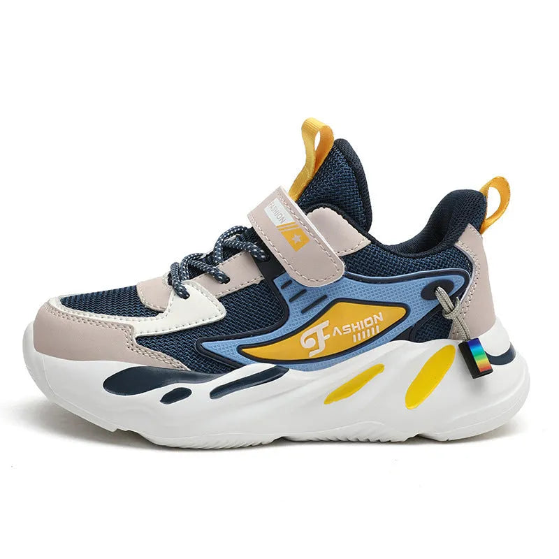 Boys dark blue and beige sports running shoes with Velcro strap and mesh upper.