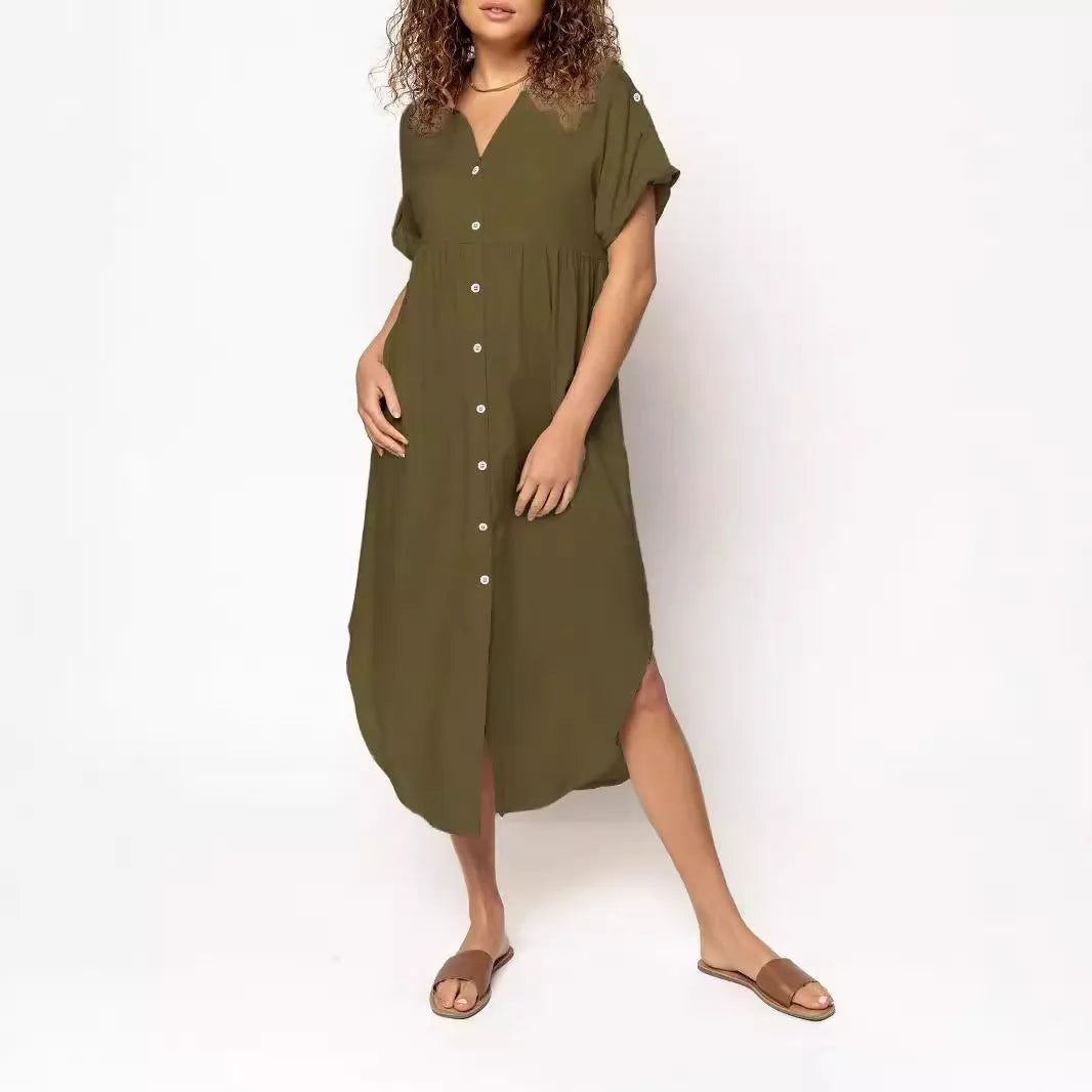 Casual solid colour mid-length dress with button front closure on a hanger.