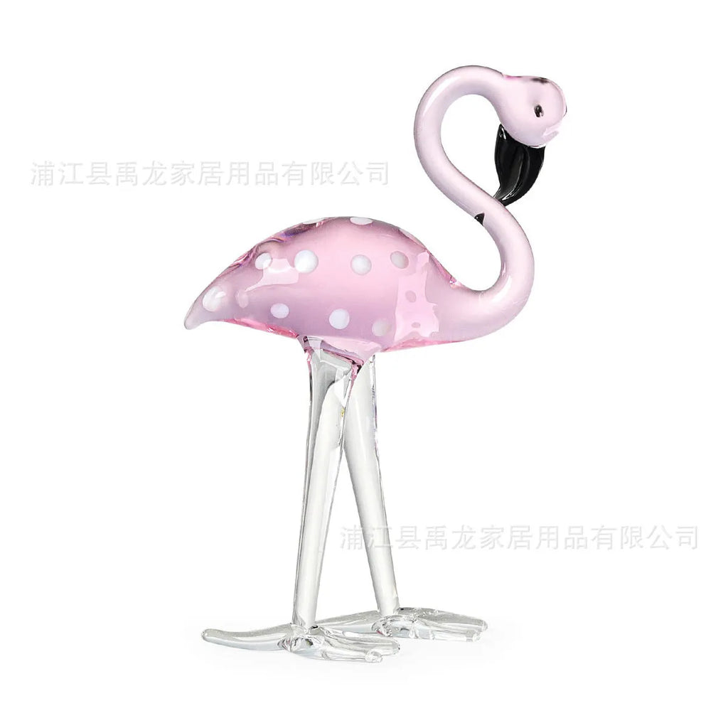 Pink crystal flamingo decorative sculpture on a table, modern simple style.