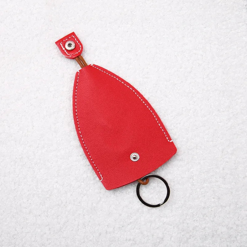 Cartoon design pull-out key case for car keys in PU leather.