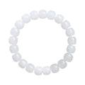 White Hetian jade barrel beads bracelet laid flat, showing unisex design and bead detail.