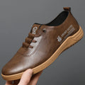 Men's lace-up casual leather shoes in black with flat heel, round toe, and front lace-up closure on a neutral background