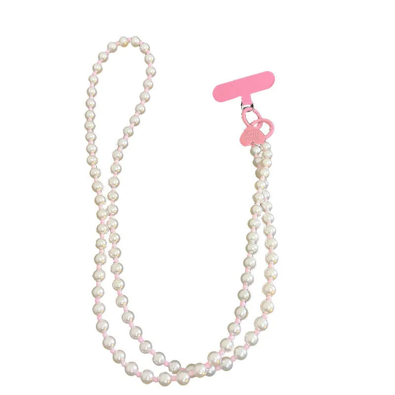 Pink pearl bead mobile phone lanyard with crossbody shoelace and wrist strap on white background