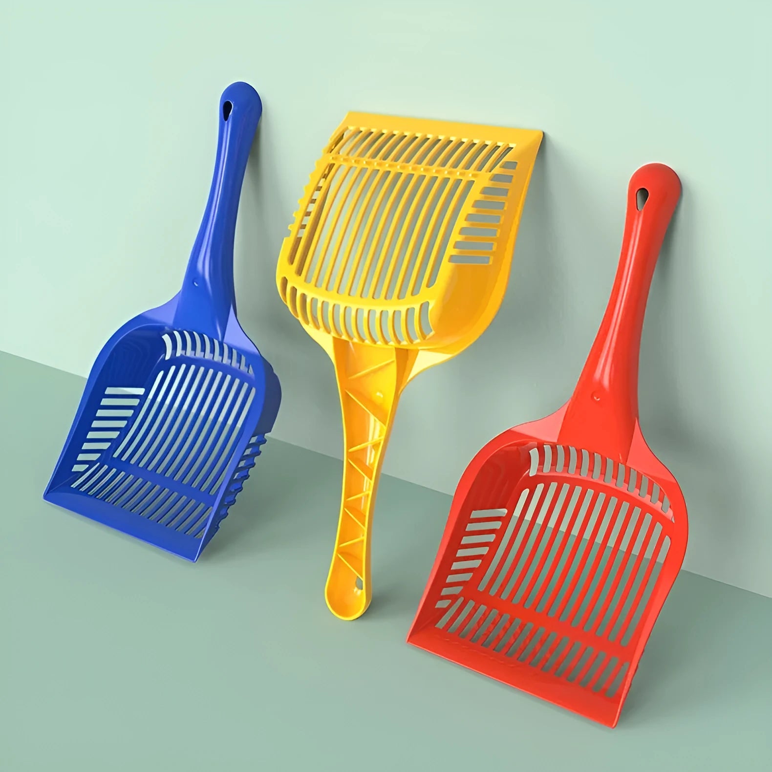 PP plastic cat litter scoop in red, yellow, or blue available in small or medium size