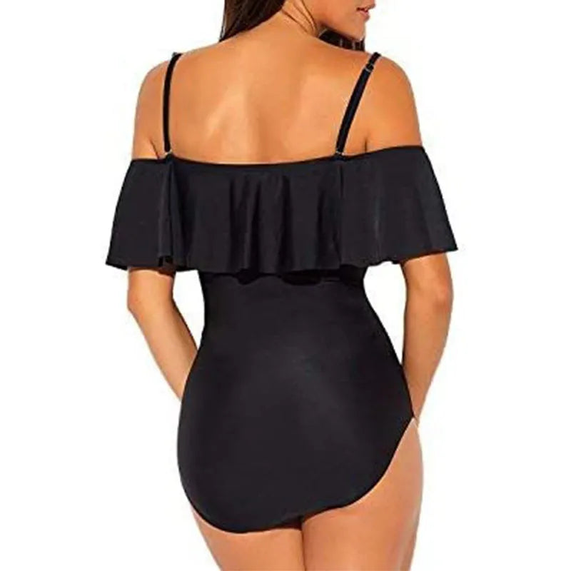 Black one-piece swimsuit with ruffled straps and side cut-out detailing.