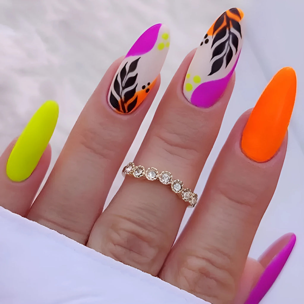 Wear Armour frosted finish nail stickers in medium almond shape showing four design patterns