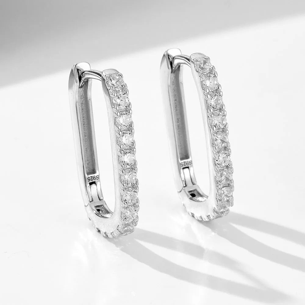 Women's oval zircon geometric earrings in sterling silver with ear clip fitting.