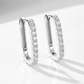 Women's oval zircon geometric earrings in sterling silver with ear clip fitting.