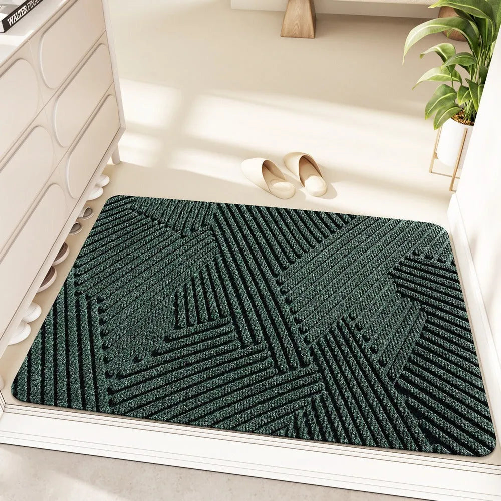 Green diatom oil entrance mat with wire ring frame measuring 60x90cm featuring alien shape and cartoon anime pattern