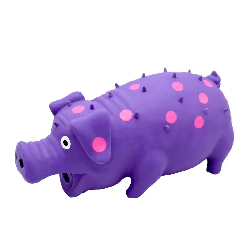 Pig-shaped latex dog chew toy with squeaker in assorted colours for aggressive chewers