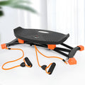 Black portable mini fitness skiing machine with elastic hand straps for indoor home workouts
