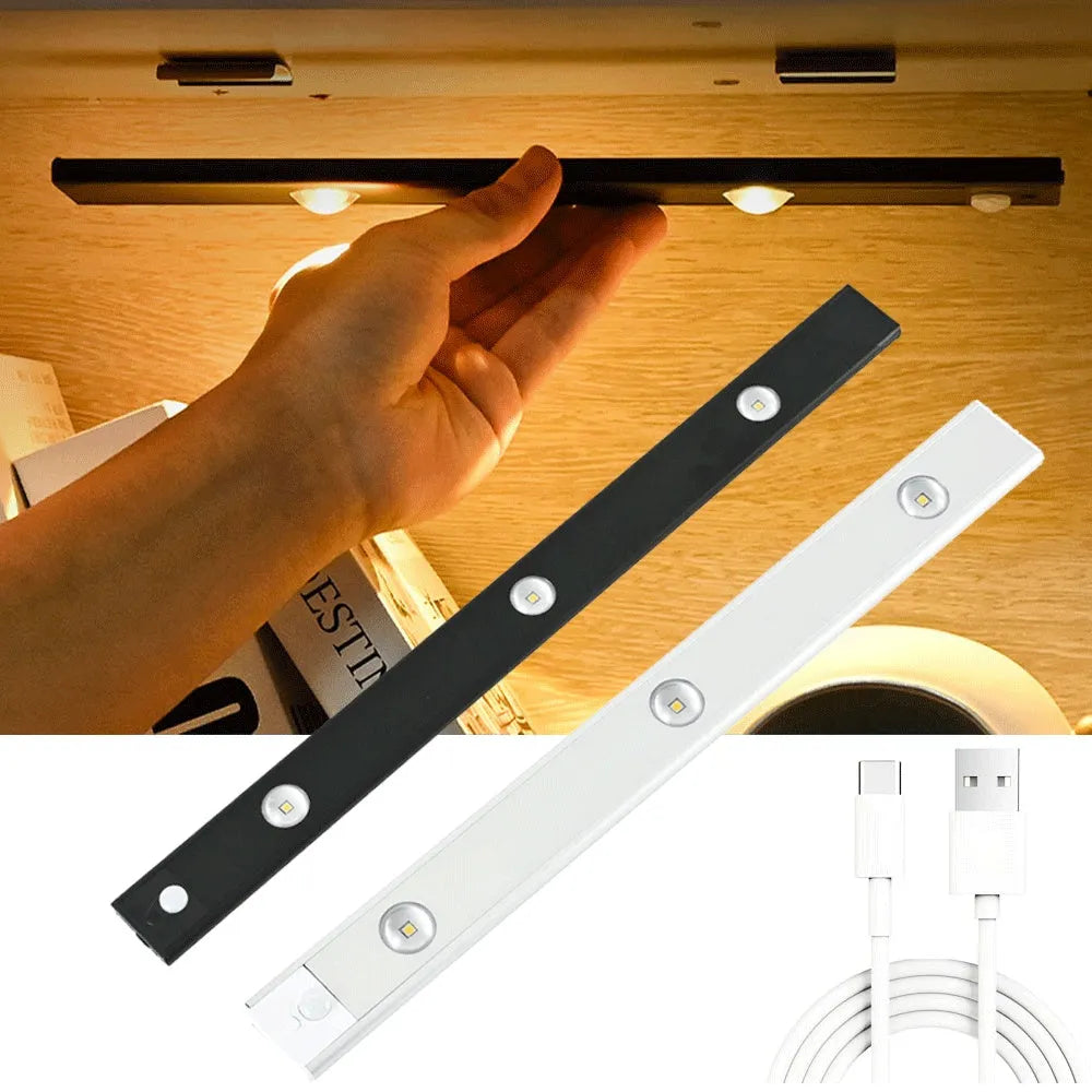 Silver ultra-thin LED light strip with motion sensor mounted inside a wooden wardrobe.