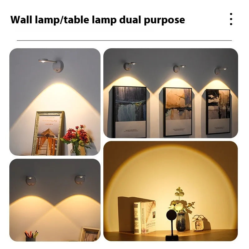 Geometric modern rechargeable wireless wall spotlight in black on a white wall.