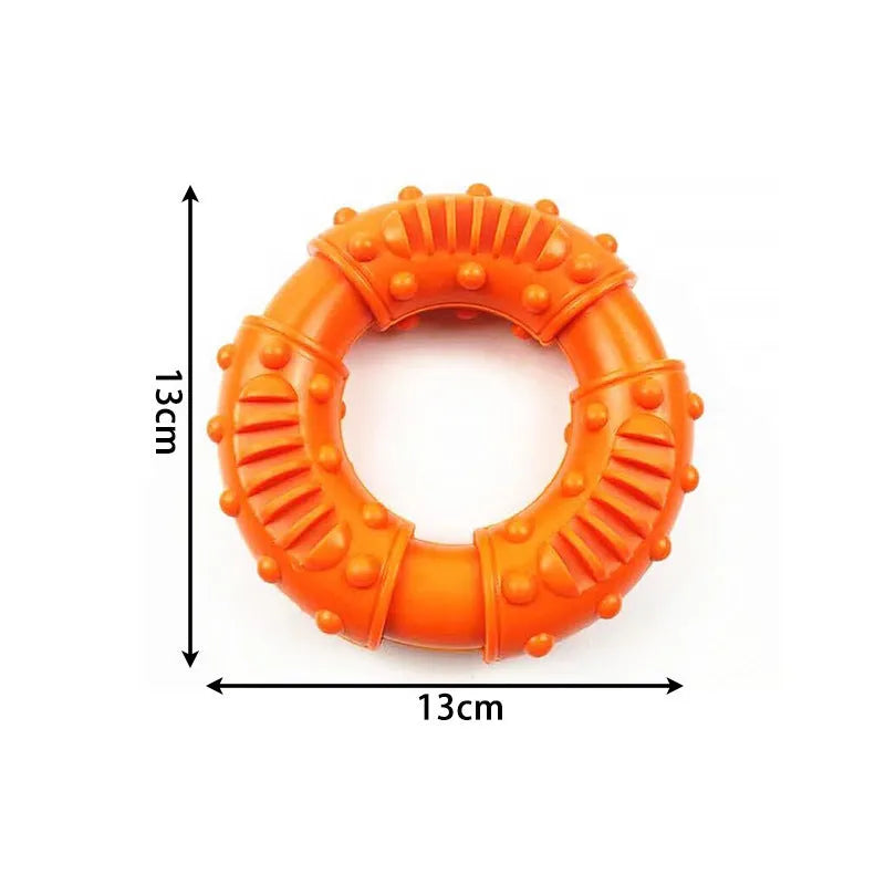Blue hollow dog fetch stick toy on grass, showing its lightweight chewy construction for safe fetching games