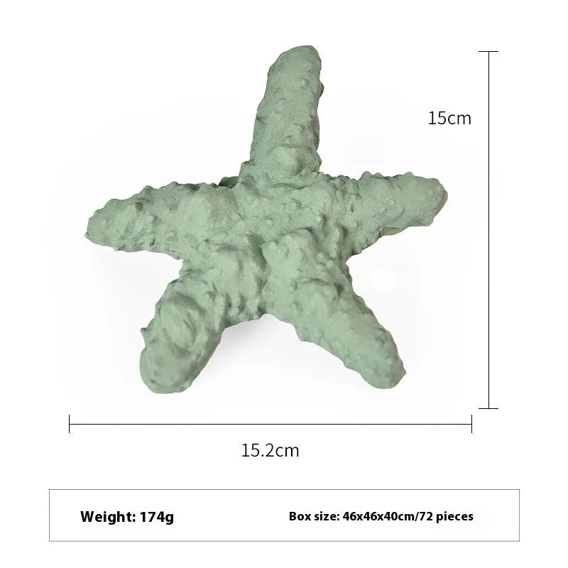 Blue rubber shark dog chew toy on a white background