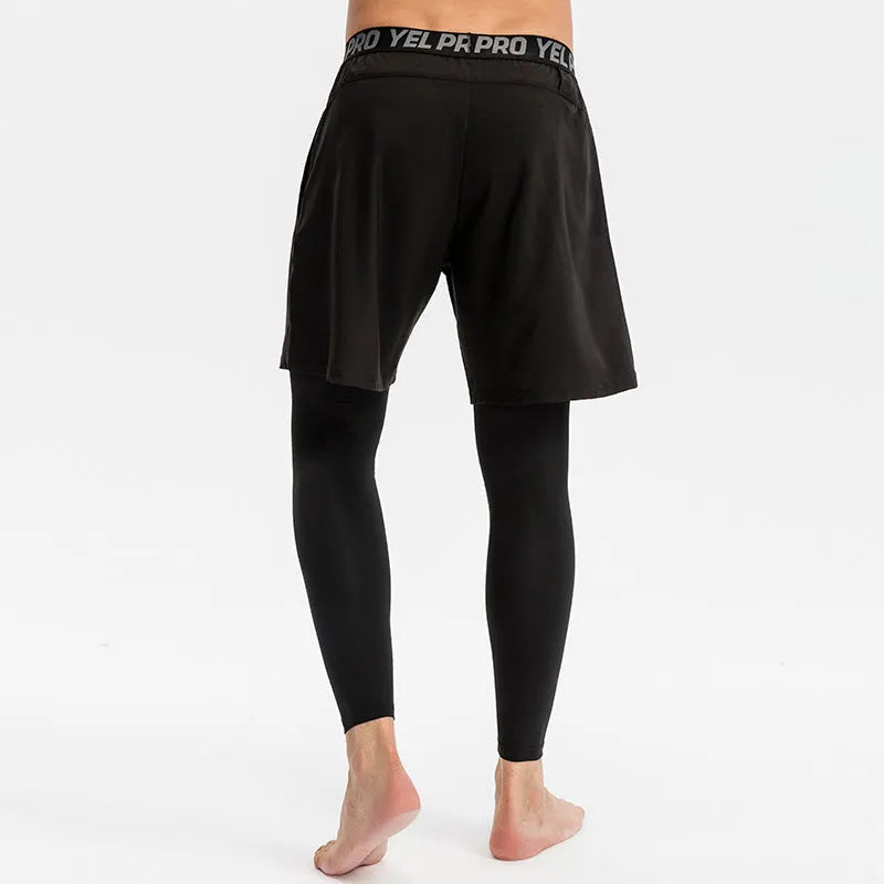 Man wearing grey quick-drying high elastic tight fitness pants for running or gym workout.