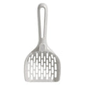 Grey plastic cat litter scoop sitting in its matching storage base