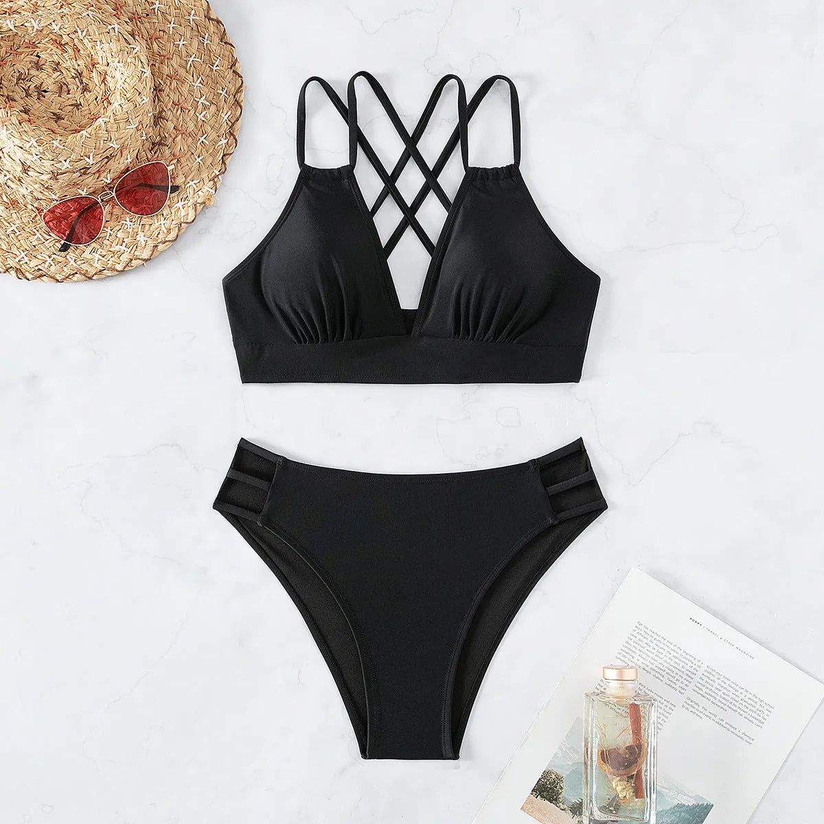 Women's black v-neck halter bikini two-piece swimsuit on a mannequin