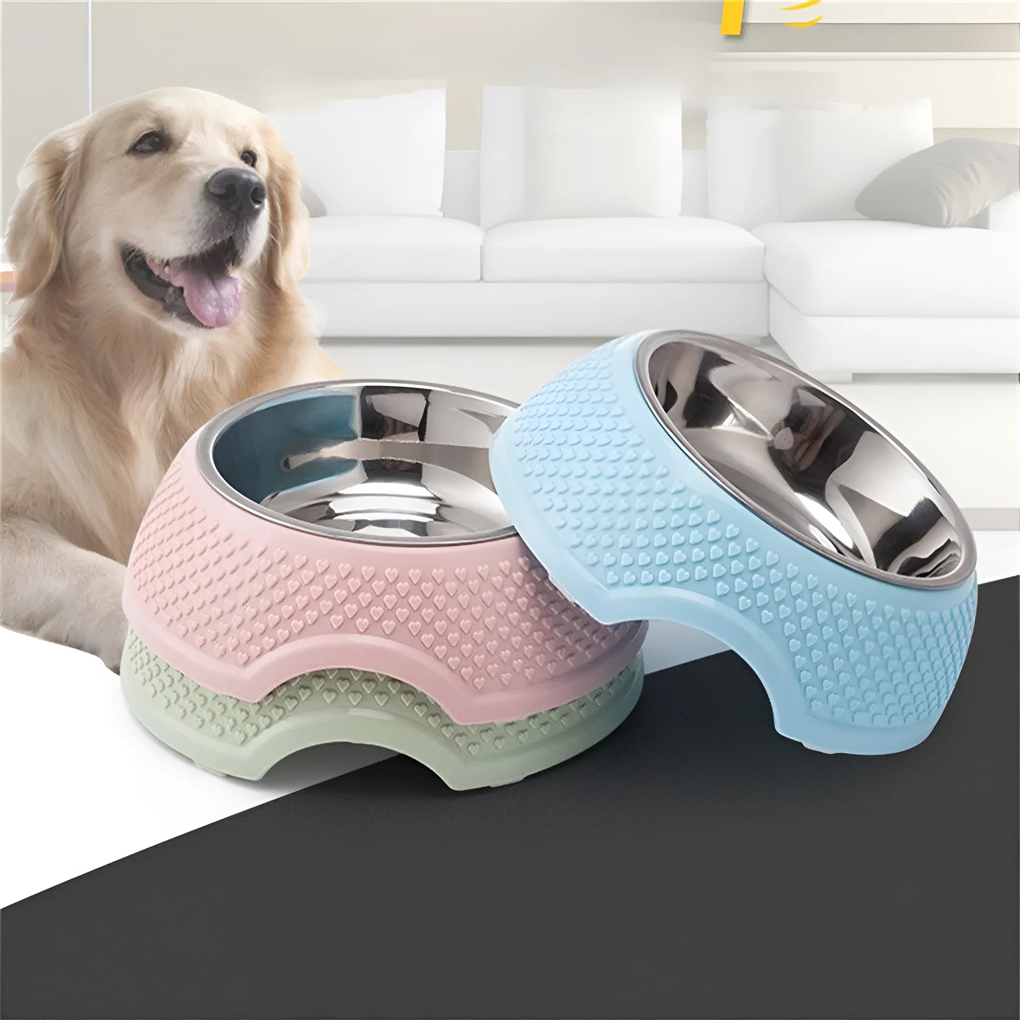 Blue stainless steel pet bowl with non-slip base on a floor