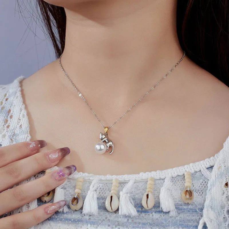 925 sterling silver cat charm clavicle necklace with an electroplated finish.