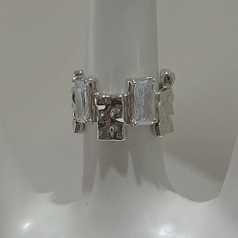 Silver geometric cross ring with zircon detailing and open pastoral retro design