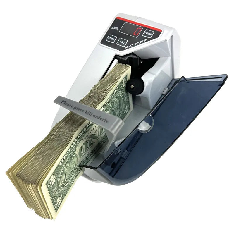 V31 foreign currency counting machine with purple light detector and LED display on a desk