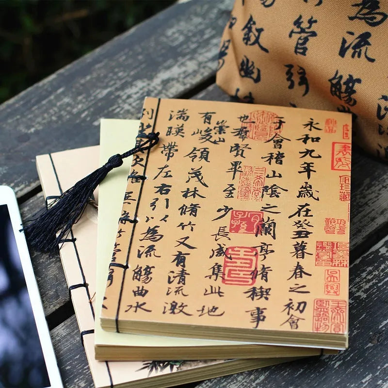 A5 antique thread-bound notebook with embossed cover and decorative tassels