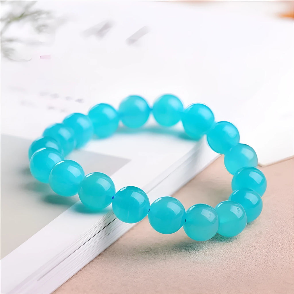 Grade 7A Amazonite natural scattered beads in blue-green ice colours with polished surfaces