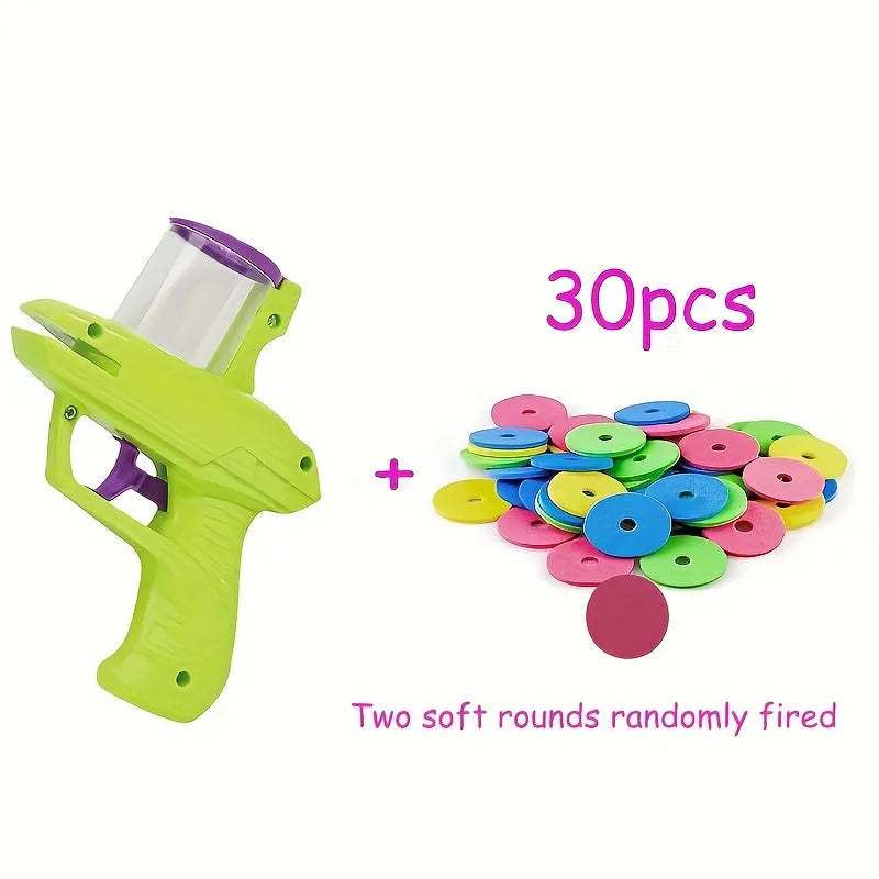 Interactive cat toy launcher with foam discs in green or purple colour options
