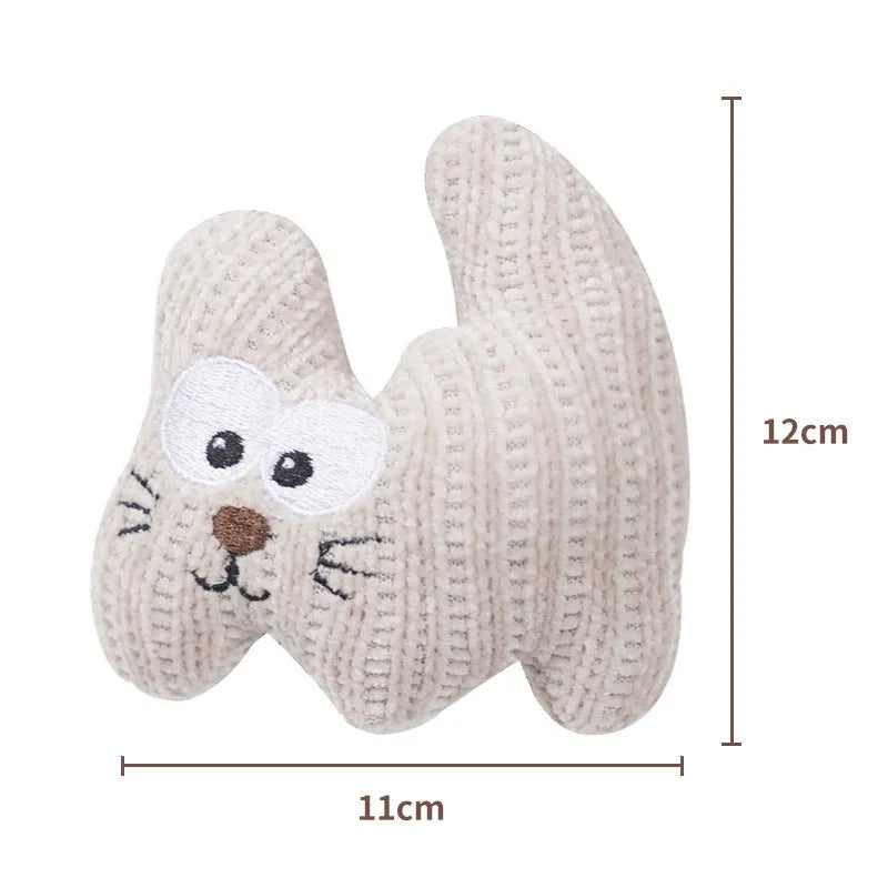 Cyan plush catnip toy with rope elements and a bell for cats on a white background