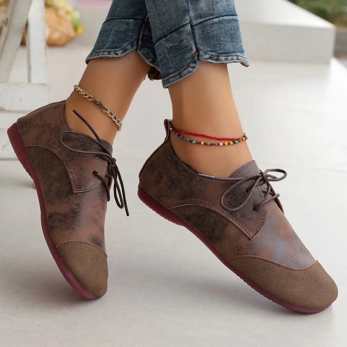 Flat retro soft leather western style slip-on loafers in black, round toe, low heel, belt decoration