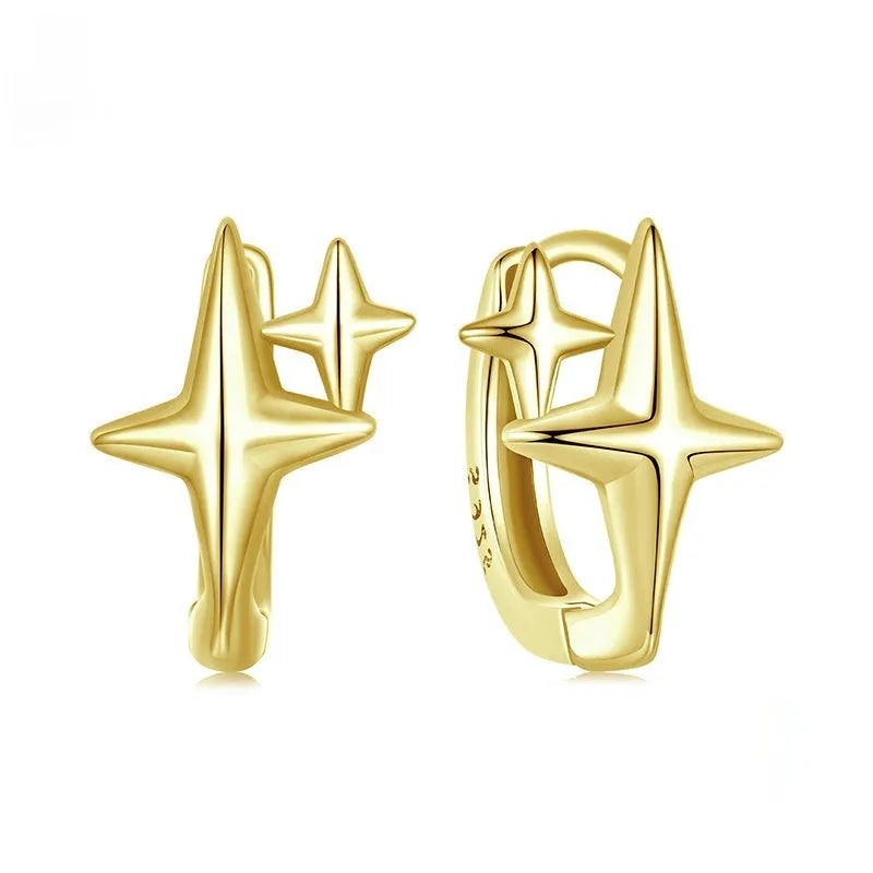 Minimalist sterling silver star ear clips with XINGX elements and oxidation treatment