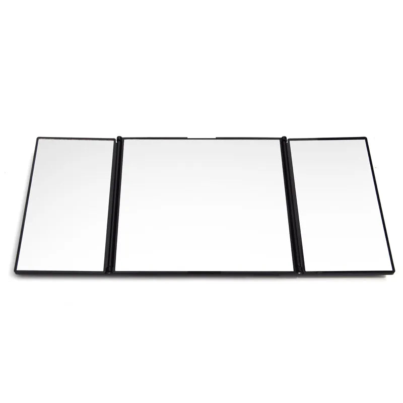 Silver folding car visor makeup mirror shown open and closed on a car sun visor