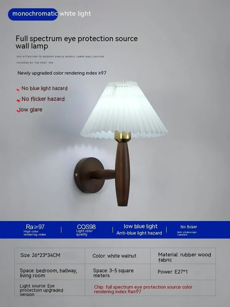 American retro walnut wood wall lamp with fabric shade on a wooden bedside table