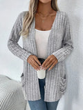 Solid colour long sleeve cardigan with pocket in loose fit, available in black or grandma grey