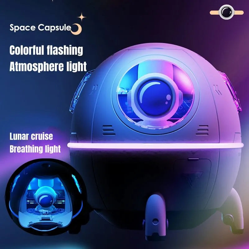 Purple astronaut-shaped USB desktop humidifier with colourful LED lights showing 220ml water capacity