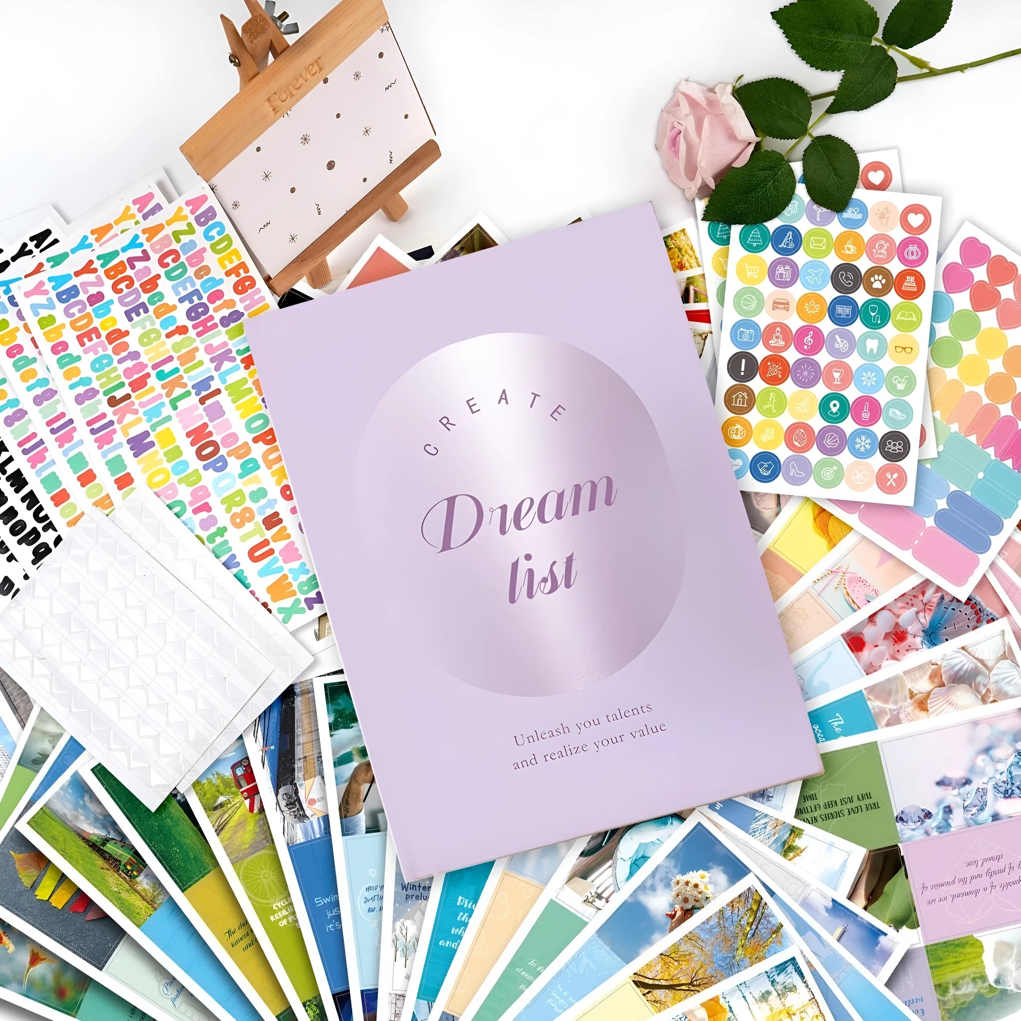 Paper vision board set with dream cut letter stickers in purple, pink, light green, blue, and light yellow options